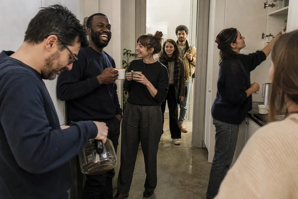 A team taking a coffee break in a Brussels office